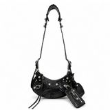 BALENCIAGA 巴黎世家 Le Cagole XS 黑色羊皮水鑽銀釦機車包 半月包 腋下包 斜背包 附愛心鏡零錢包｜KÉSH 凱仕精品