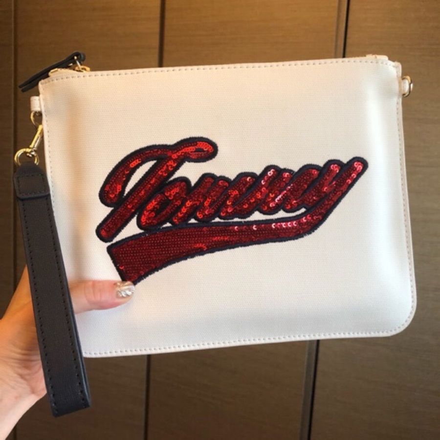 二手正品9.5新Tommy Hilfiger手拿包(附紙袋、防塵套)雙邊扣環可自加背帶-1