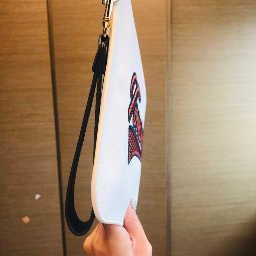 二手正品9.5新Tommy Hilfiger手拿包(附紙袋、防塵套)雙邊扣環可自加背帶-3