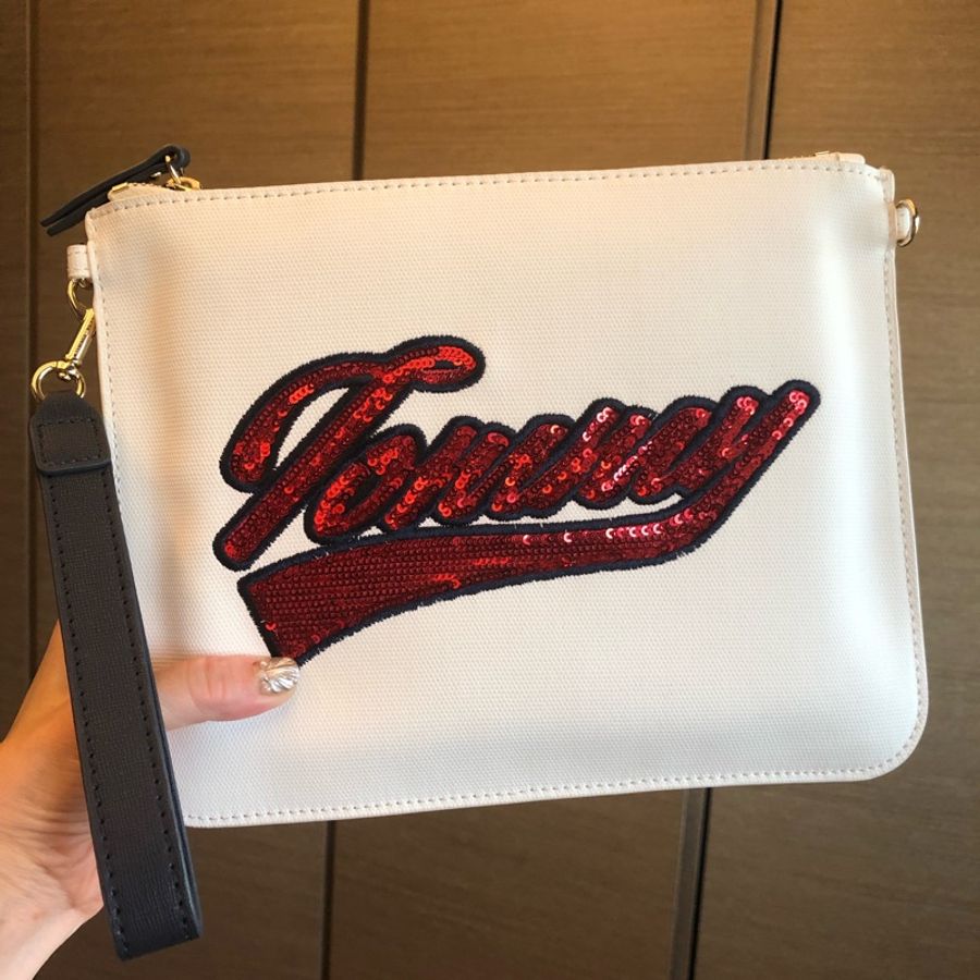 二手正品9.5新Tommy Hilfiger手拿包(附紙袋、防塵套)雙邊扣環可自加背帶-5