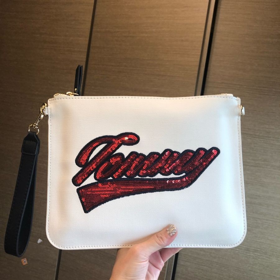 二手正品9.5新Tommy Hilfiger手拿包(附紙袋、防塵套)雙邊扣環可自加背帶-9