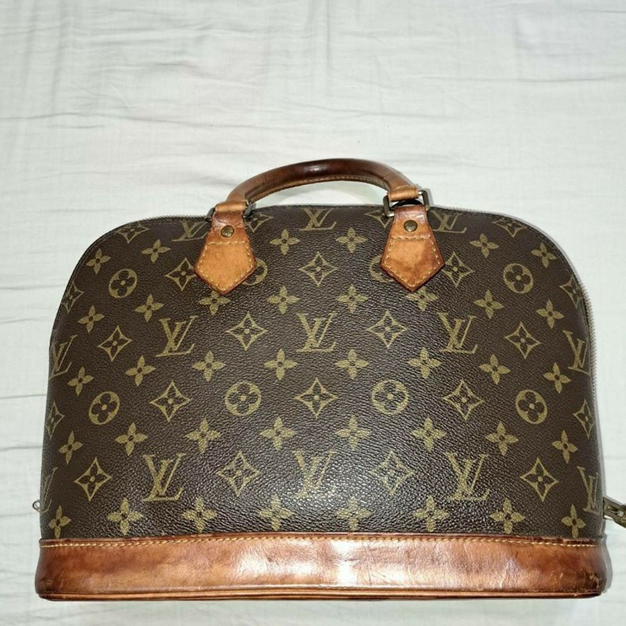LV 精品手拿包-0