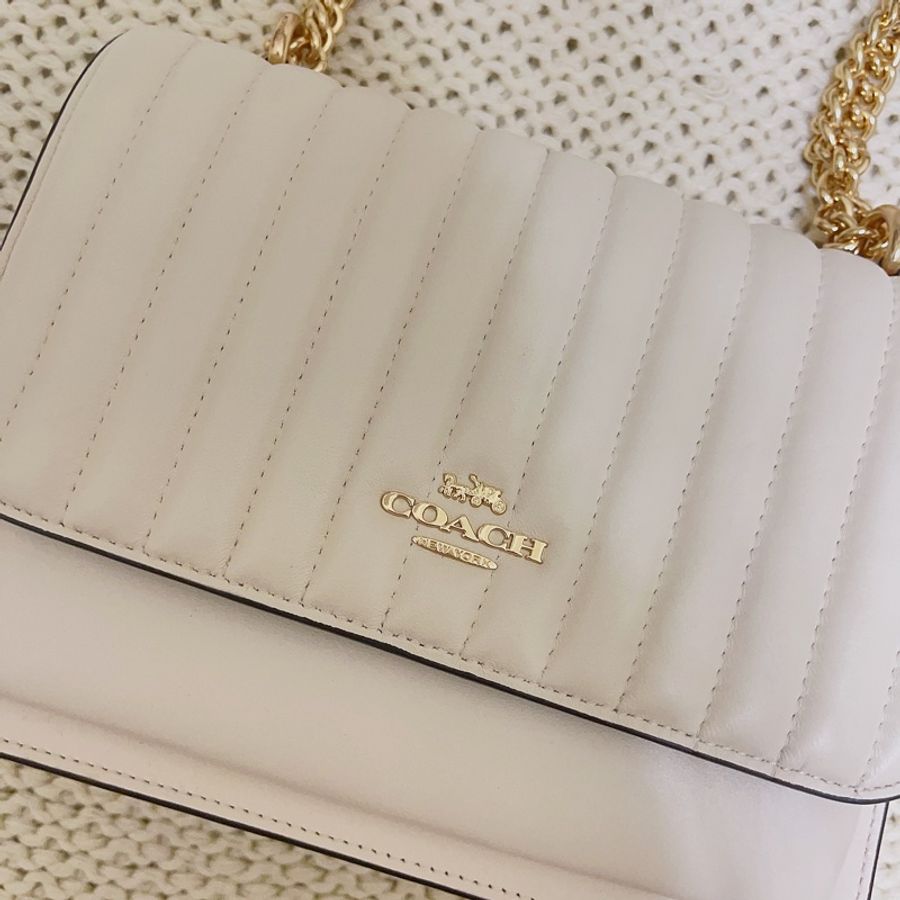 全新coach 小羊皮風琴包-1