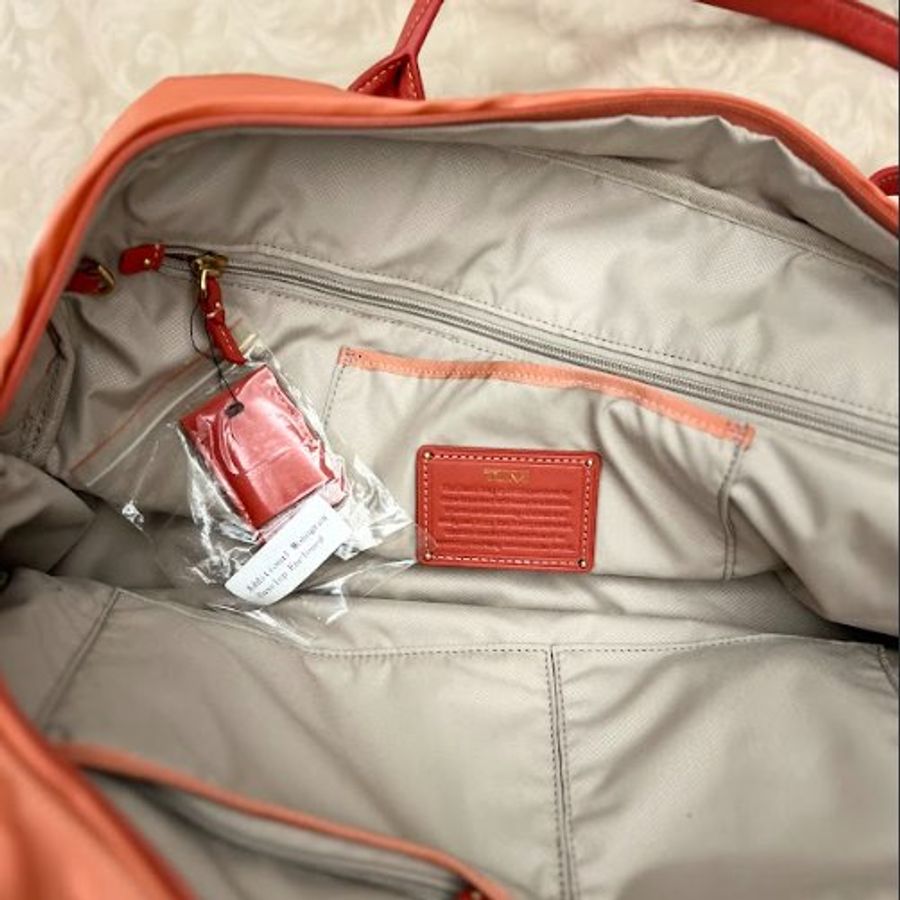 TUMI橘色登機旅行包-6