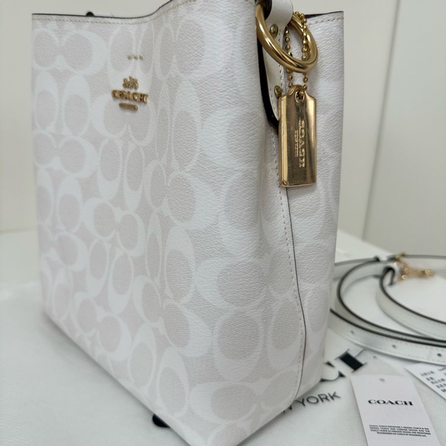 COACH 經典C LOGO肩/斜背兩用水桶包(白) 老花水桶-1