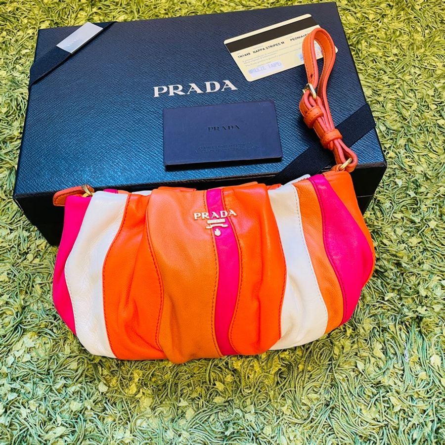 二手正品/Prada 橙色牛皮/條紋手拿包/附盒子/保卡/義大利製/雙邊有孔可自+背帶變斜背包/側背包(看圖看內文)-0