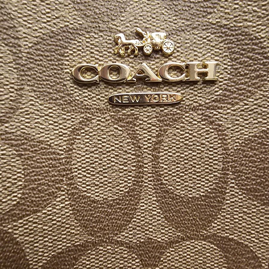 Coach橘帶老花咖啡c logo水桶包-18