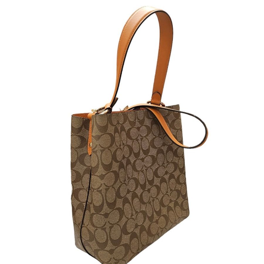 Coach橘帶老花咖啡c logo水桶包-1