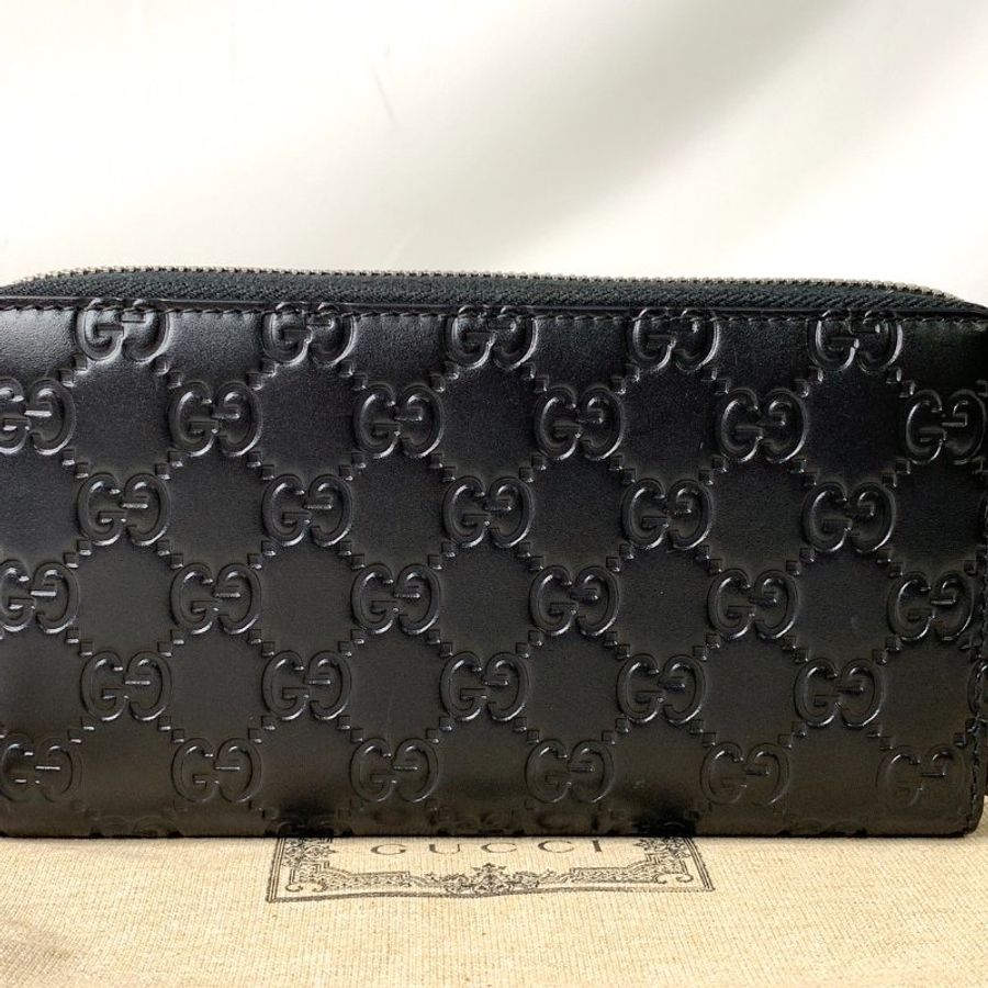 GUCCI Signature 牛皮拉鍊長夾-1