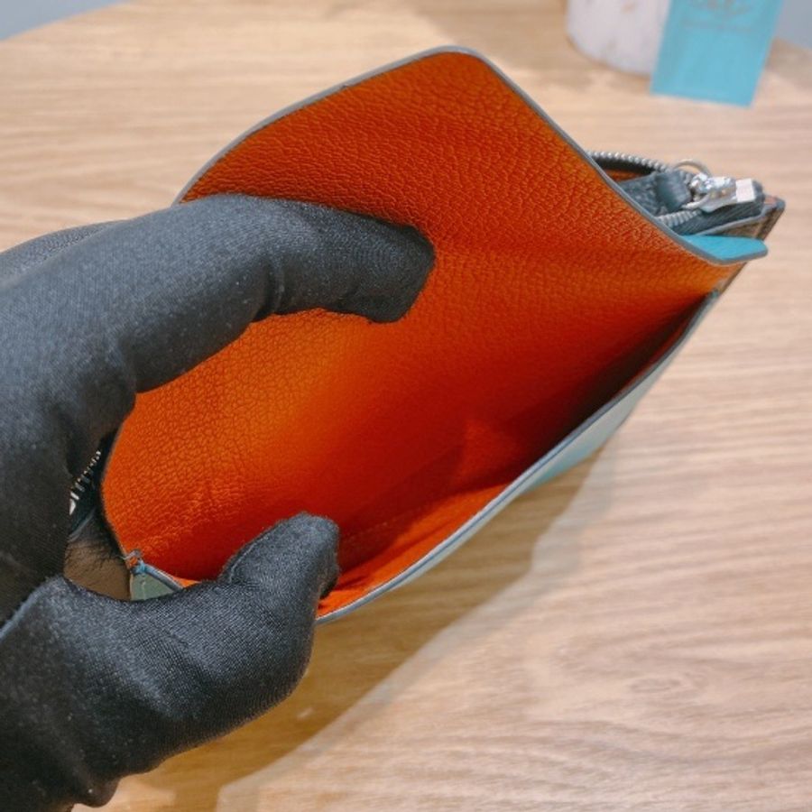 Moynat 摩奈拉鍊手拿包採用經典 Trousse Enveloppe Pouch MM-5