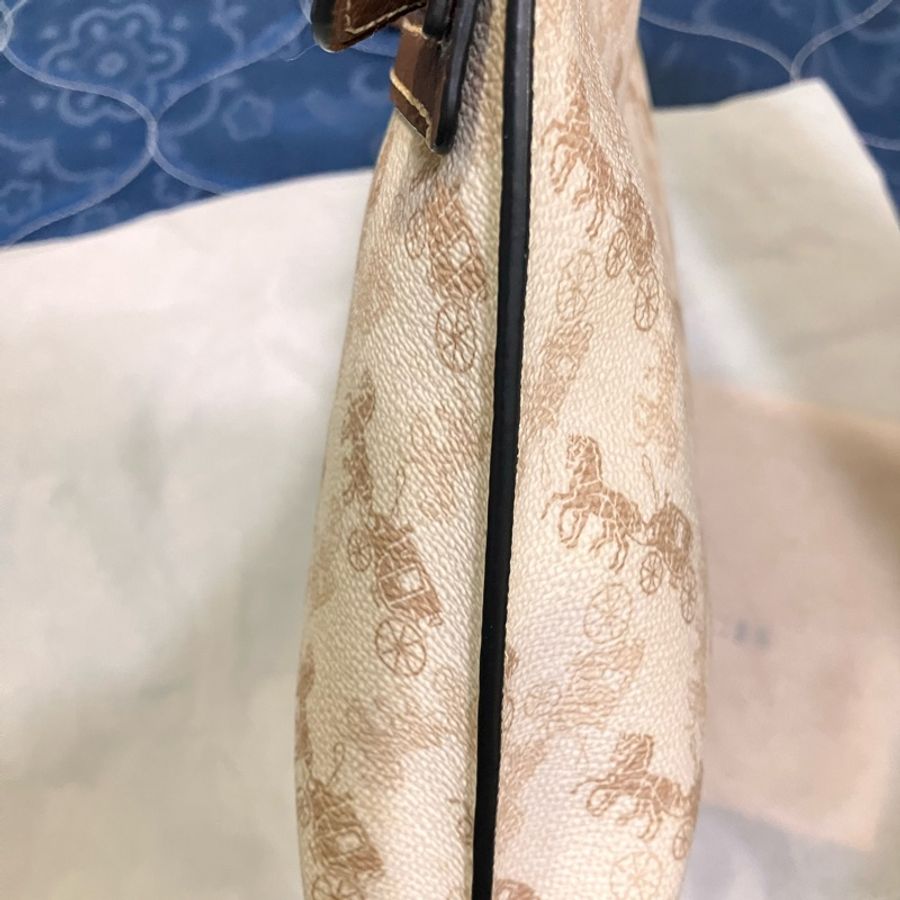 美國官網購入 COACH白馬車印花手拿包-6