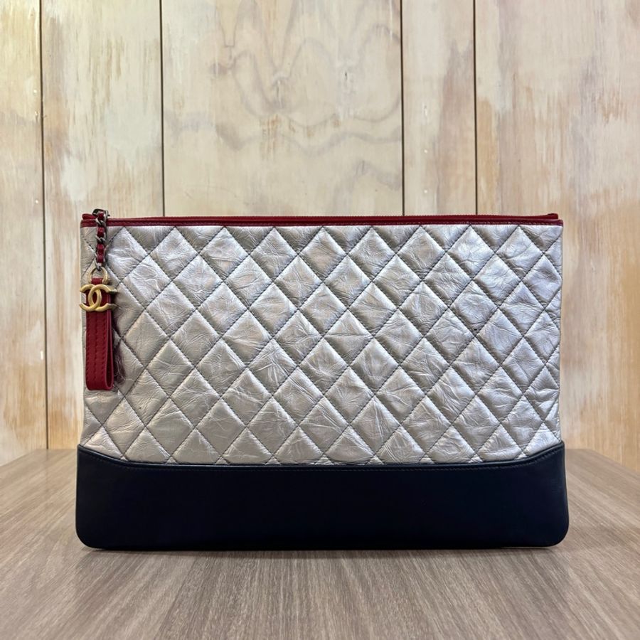 稀有Chanel A84288銀復古牛皮流浪系列手拿包-0