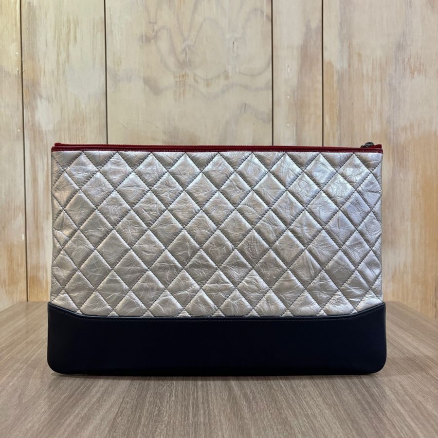 稀有Chanel A84288銀復古牛皮流浪系列手拿包-1
