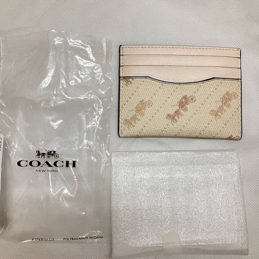 全新美國官網購入COACH白馬車老花卡片套-0