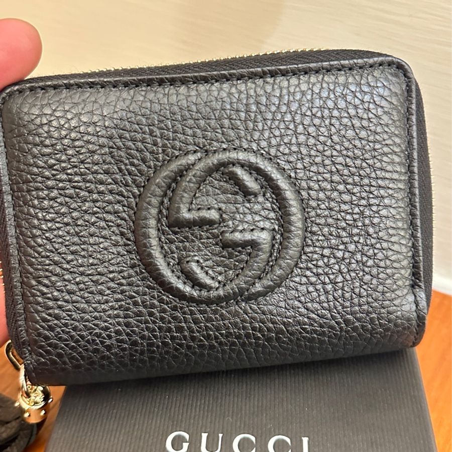 GUCCI 黑皮革流蘇ㄇ拉零錢卡包-1