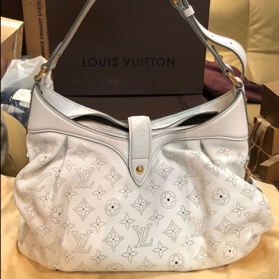 LOUIS VUITTON LV 路易威登 白色米白全皮雷射洞洞林志玲包肩背包葵花包附帶可加長 附防塵袋防塵盒 原價103000元 101購入證明-0