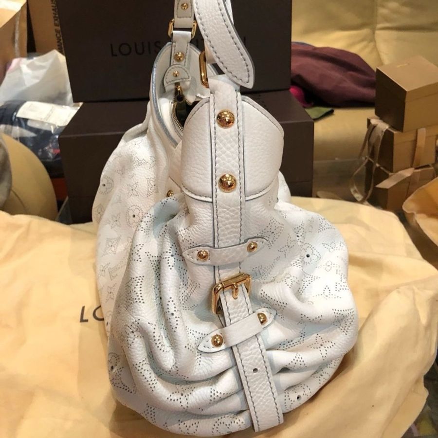 LOUIS VUITTON LV 路易威登 白色米白全皮雷射洞洞林志玲包肩背包葵花包附帶可加長 附防塵袋防塵盒 原價103000元 101購入證明-7