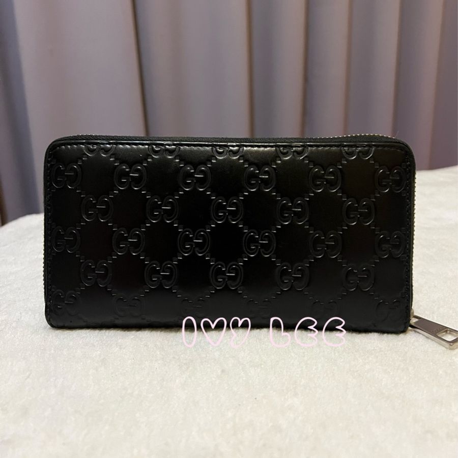 GUCCI 473928 經典Signature系列GG壓紋銀色金屬LOGO牛皮拉鍊長夾(黑色) 二手精品-1