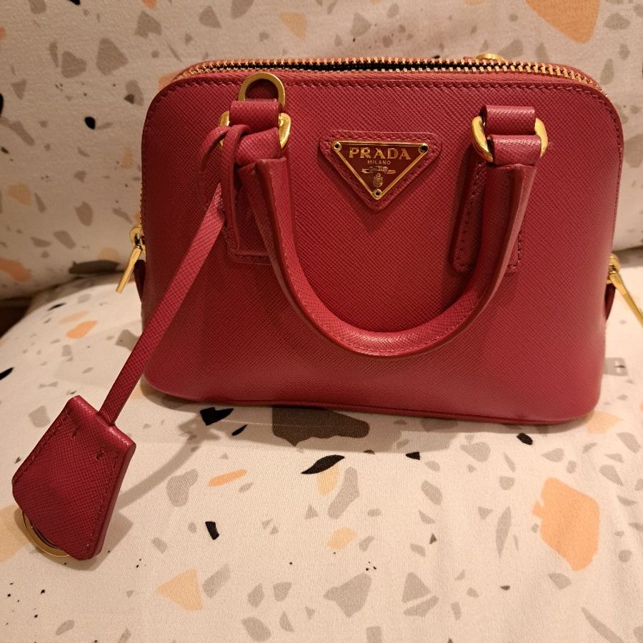 Prada 桃粉防刮牛皮金扣mini手提斜側背貝殼包-1