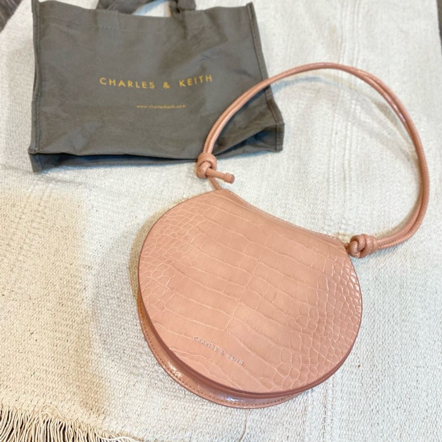 Charles & Keith 蜜桃色可調式硬殼紋路肩背包-0