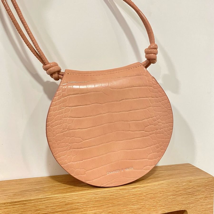 Charles & Keith 蜜桃色可調式硬殼紋路肩背包-3