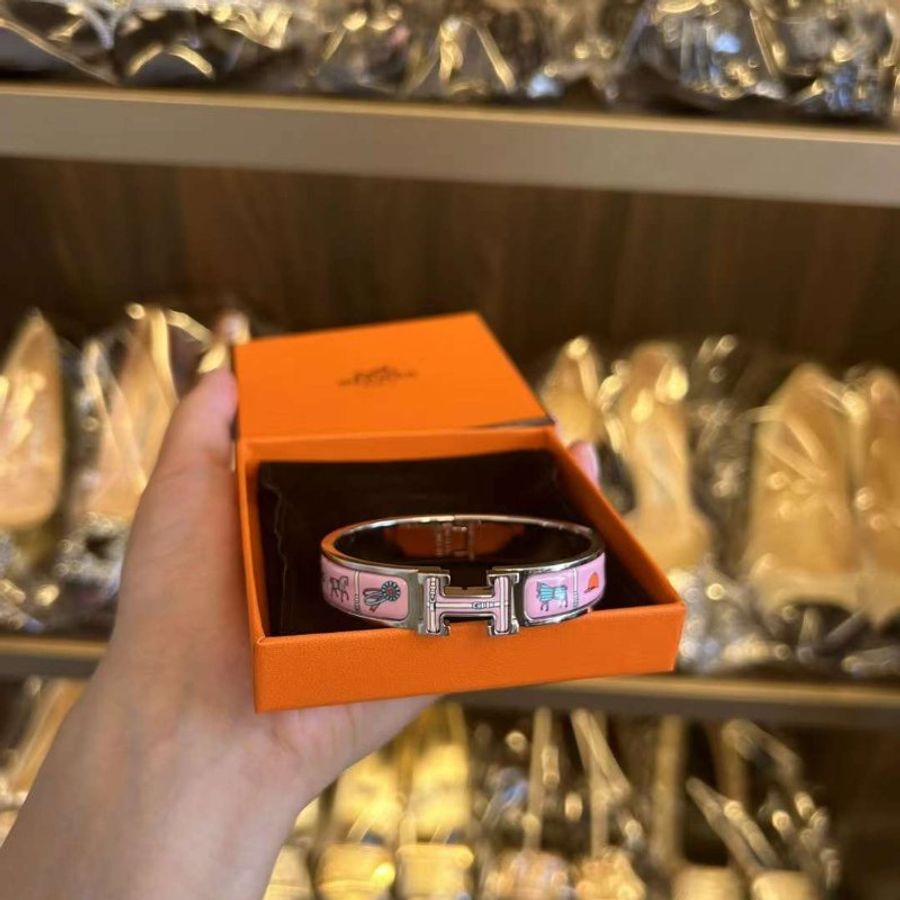 Hermes 手鐲 全新膜還在 這款常見的是金色配粉色 銀色的很難買搭配粉色塗鴉更好看-1