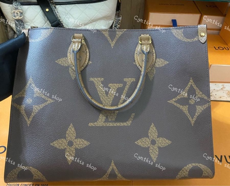 Lv on the go mm雙色花紋皮革手提包中號m45321-0