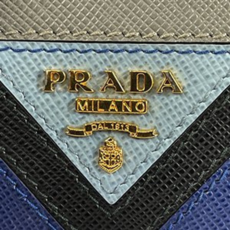 PRADA灰色防刮牛皮拚色造型對開短夾 1MV204-7