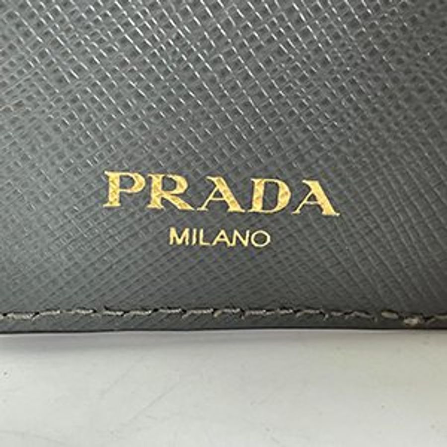 PRADA灰色防刮牛皮拚色造型對開短夾 1MV204-9