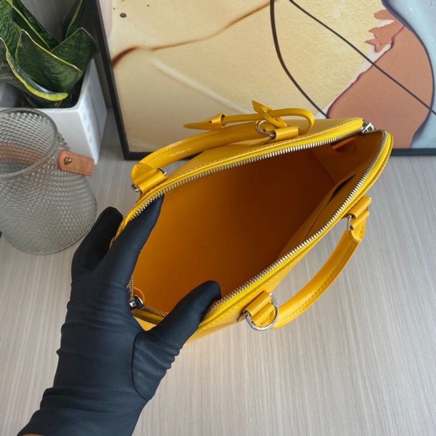 LV alma中號 黃色 水波紋貝殼包-8