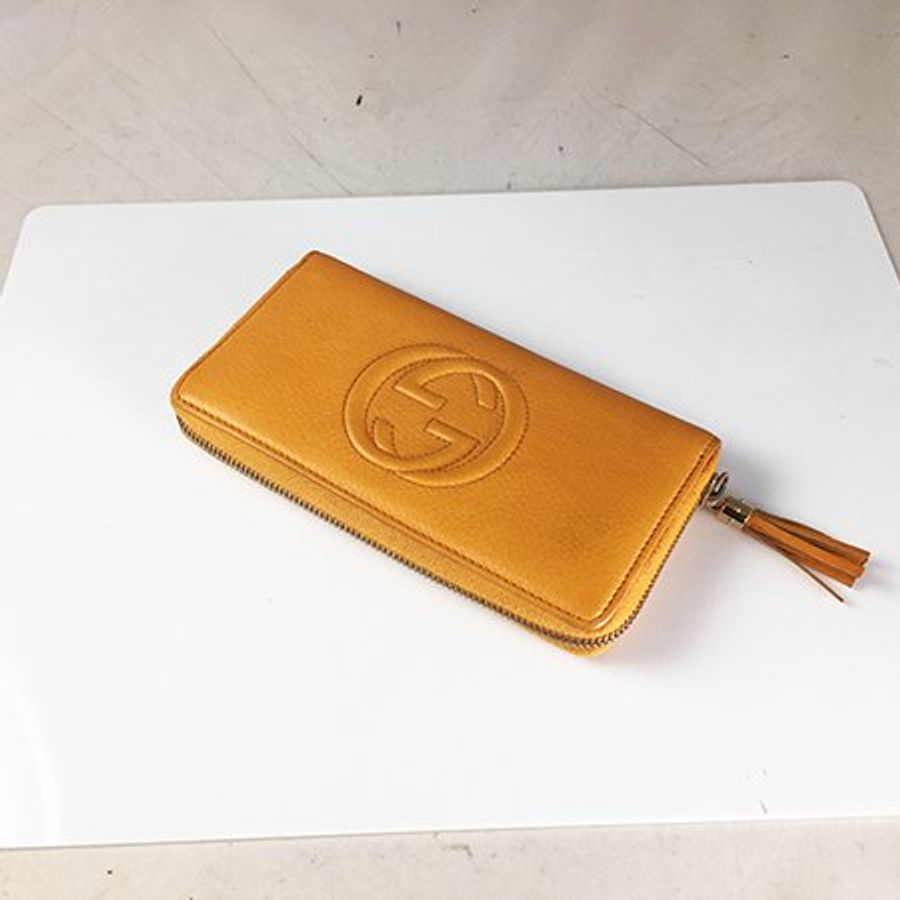 GUCCI柳橙黃全皮SOHOㄇ字拉錬長夾308004-2