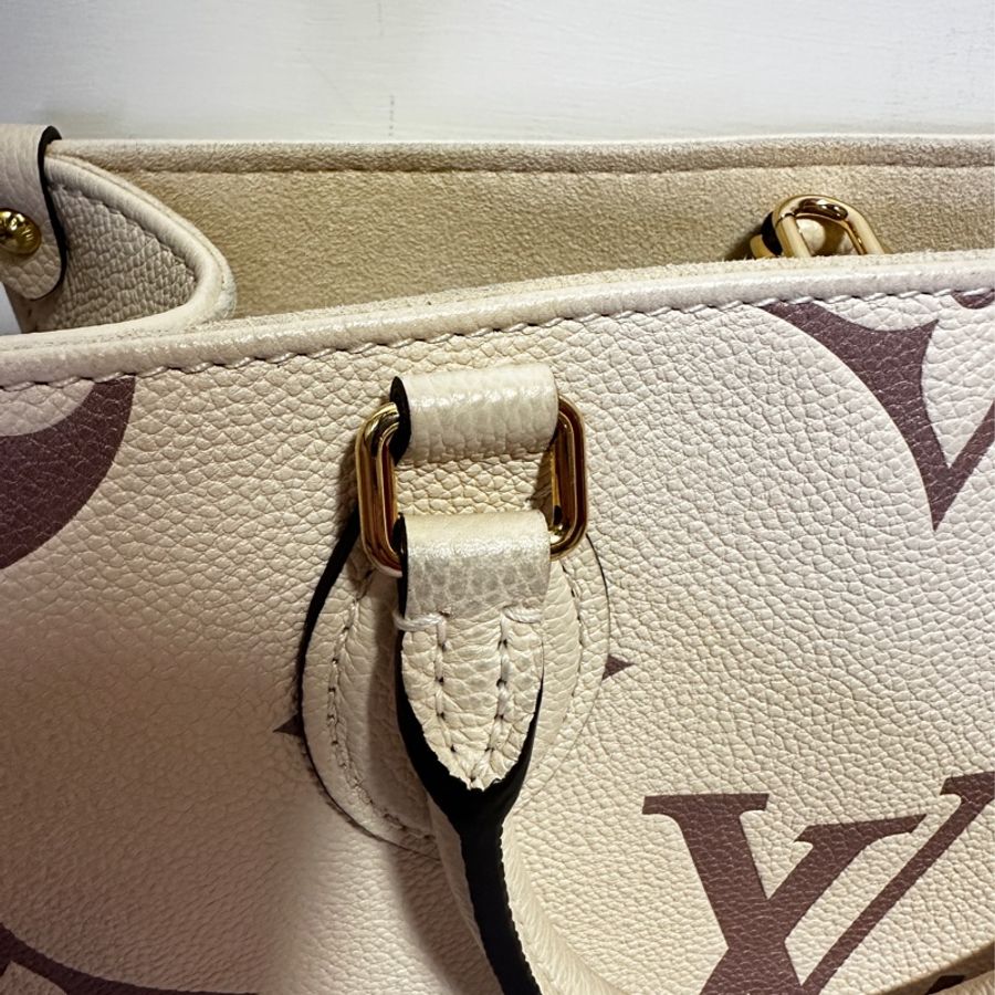 LV Onthego PM 奶白牛皮壓紋 M45654-8
