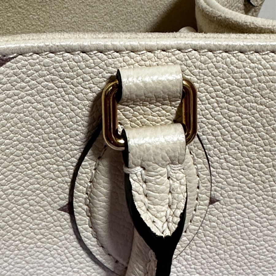 LV Onthego PM 奶白牛皮壓紋 M45654-9