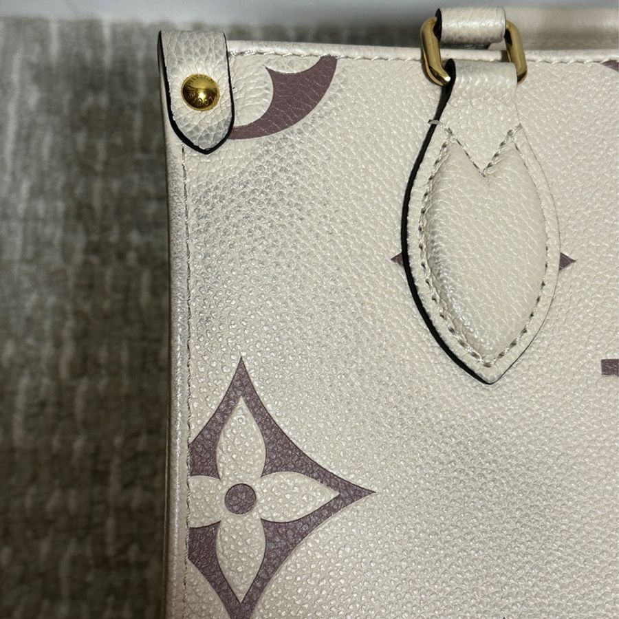 LV Onthego PM 奶白牛皮壓紋 M45654-14