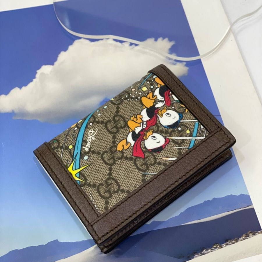 gucci PVC 拚咖牛皮迪士尼塗鴉唐老鴨5卡mini短夾-6