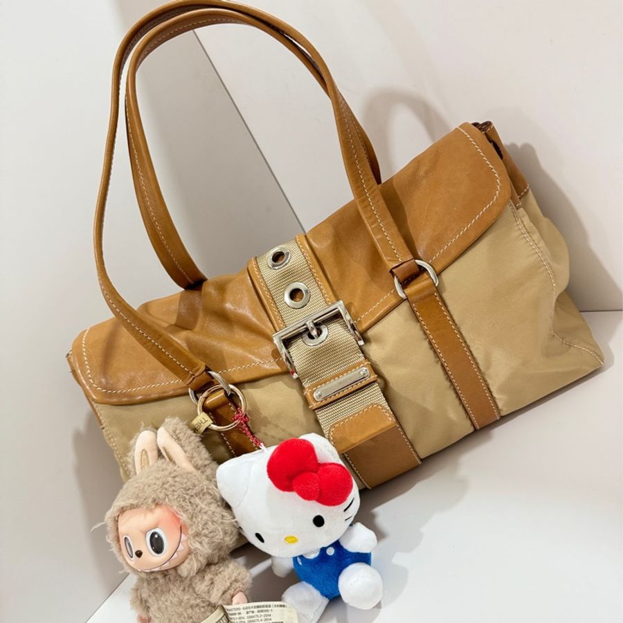 Prada beige tessuto buckle shoulder bag.-0