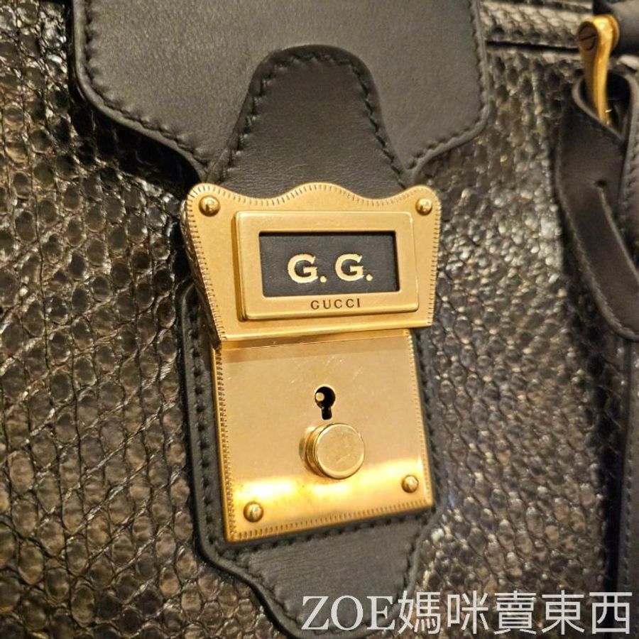 GUCCI 黑色蛇皮流蘇拉鍊手提包-4