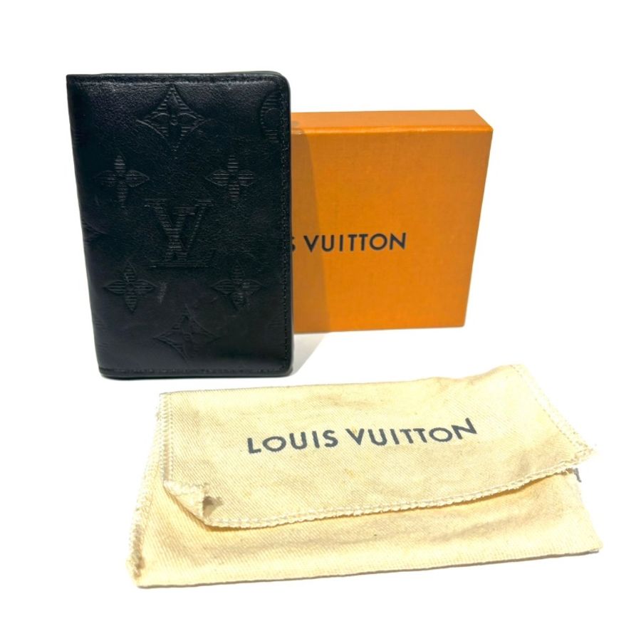 【美收精品】LV M62899 經典花紋壓印小牛皮對開式卡夾(黑) 1-282-0