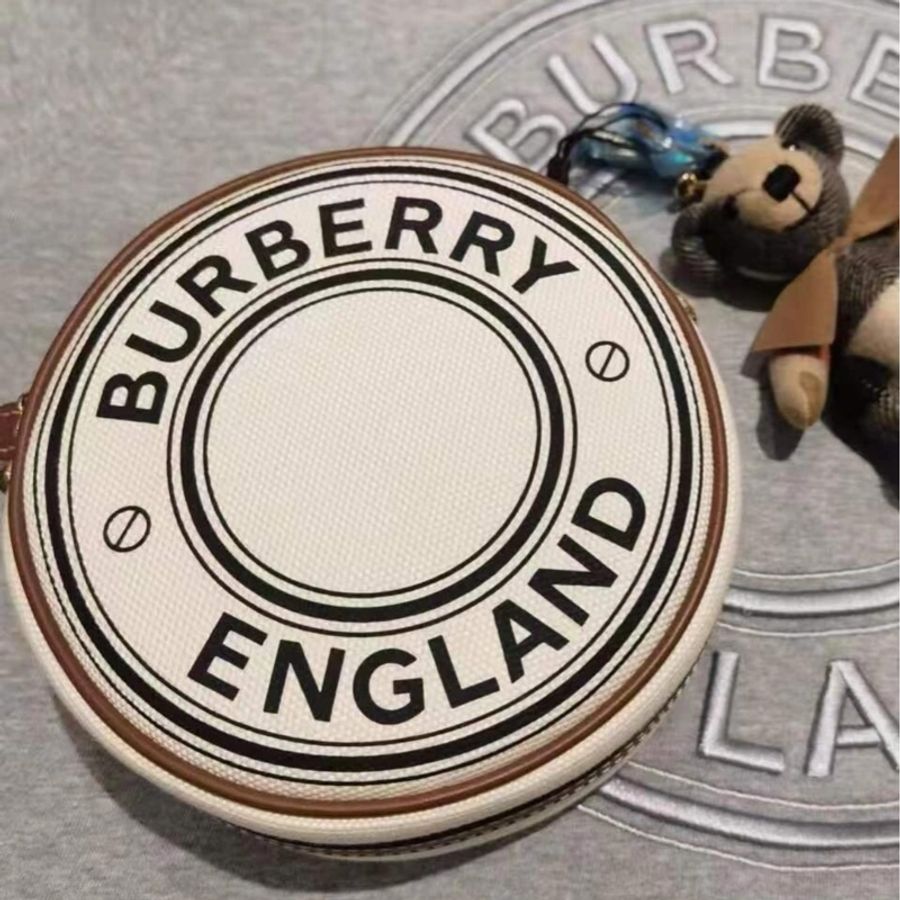 Burberry 咖牛皮拚米帆布金釦圓餅斜背包-0