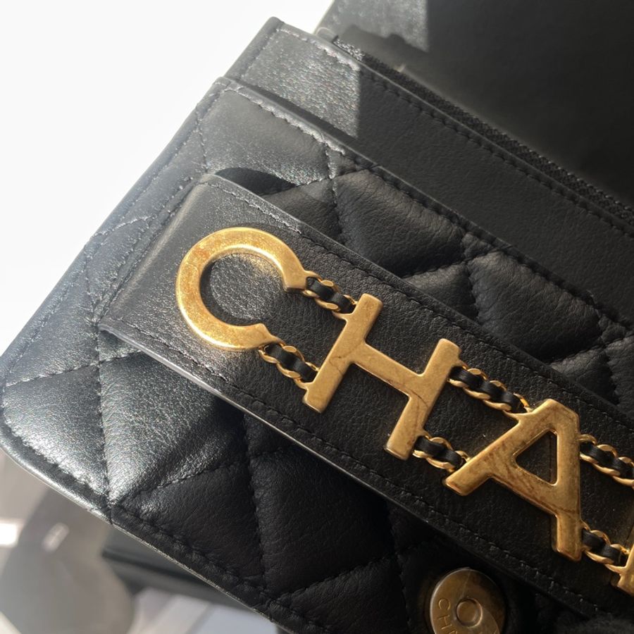 Chanel黑金羊皮字母woc-11