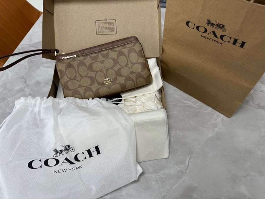 coach 手拿包-0