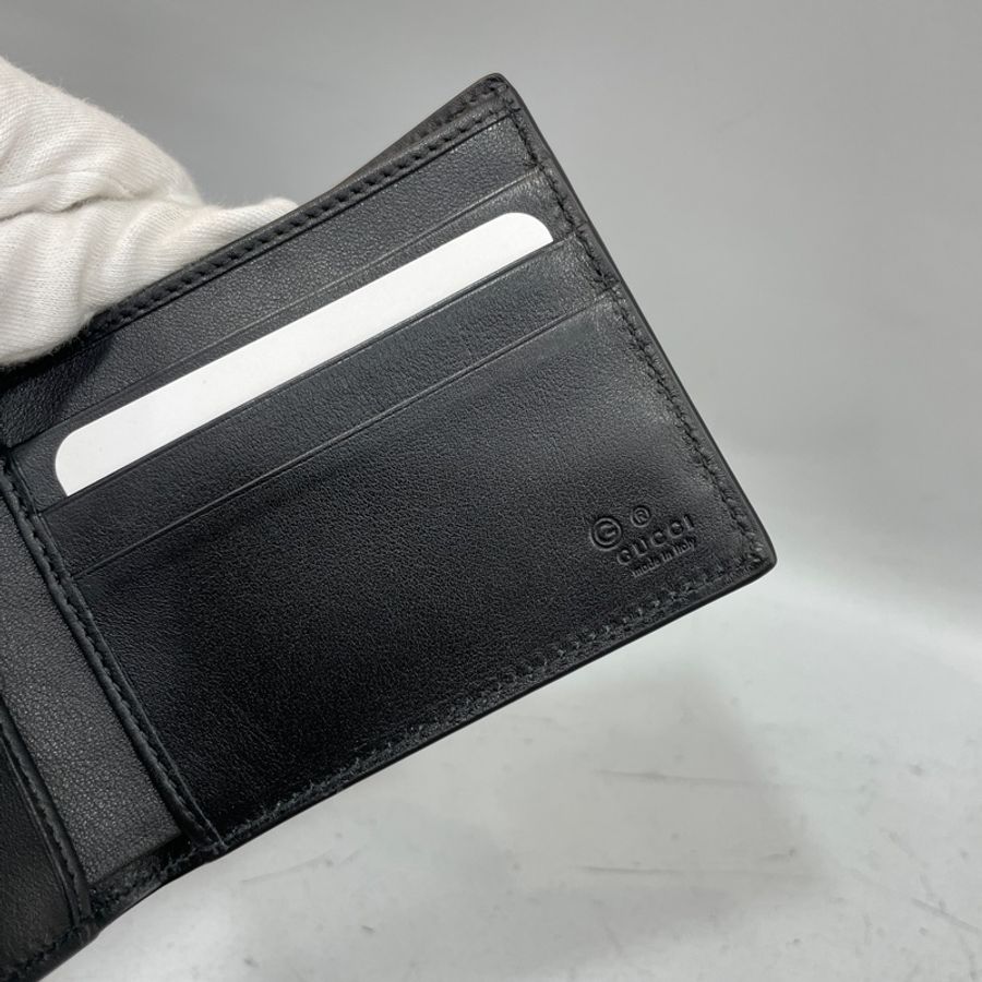 Gucci 260987黑牛皮壓紋對開短夾-8
