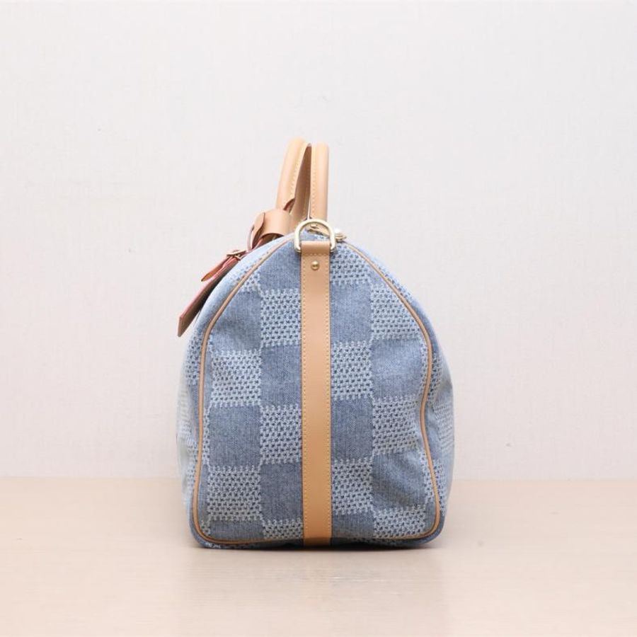 LOUIS VUITTON(路易威登) 牛仔藍 牛仔布 KEEPALL 50 配肩帶 丹寧牛仔 棋盤格 晶片-1