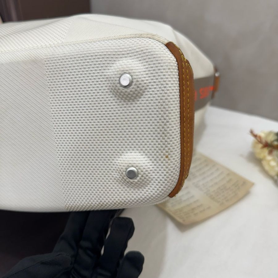 Louis Vuitton Damier geant vintage 螢光橘線條縮口水桶包-8