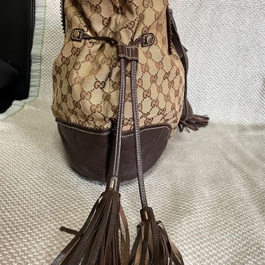 Gucci. 愛心小金人流蘇托特包-12