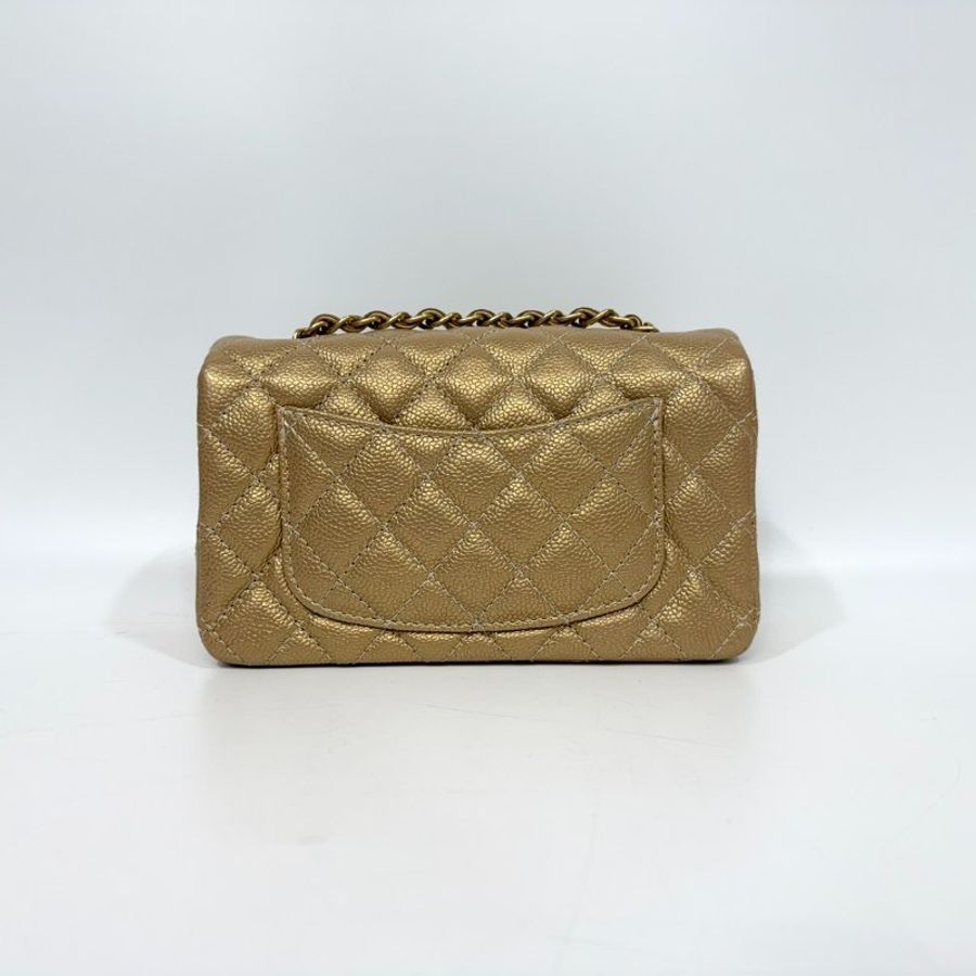 CHANEL 金色牛皮金釦COCO20/A69900-1
