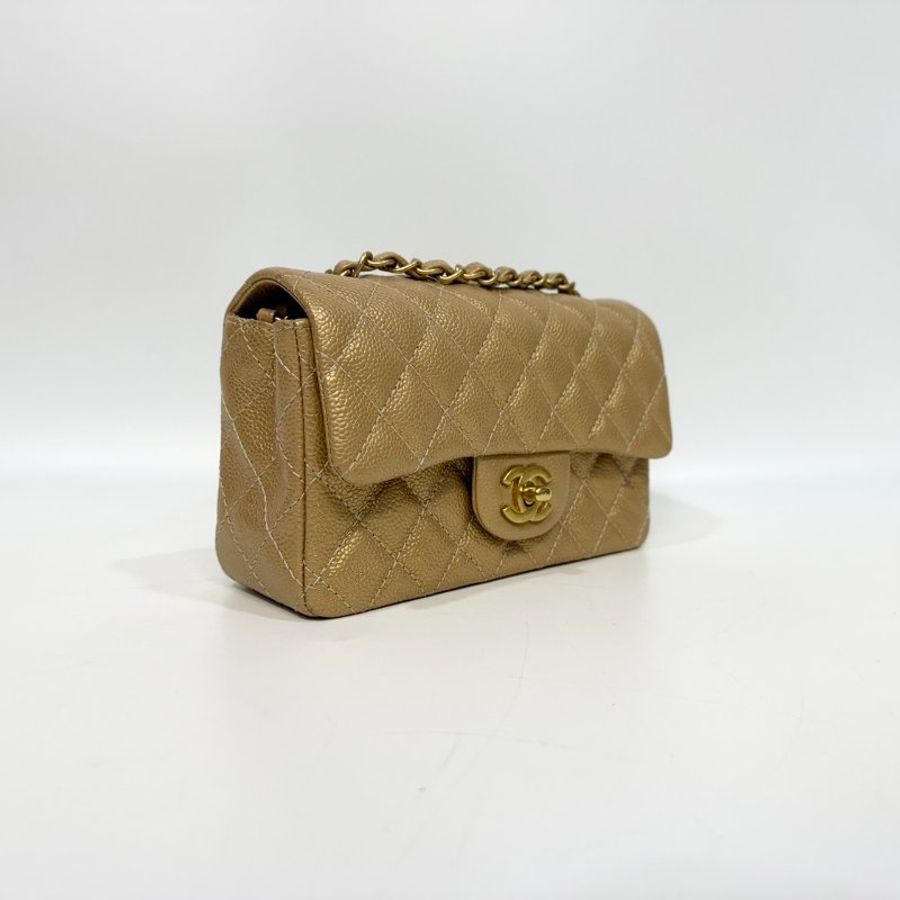 CHANEL 金色牛皮金釦COCO20/A69900-3