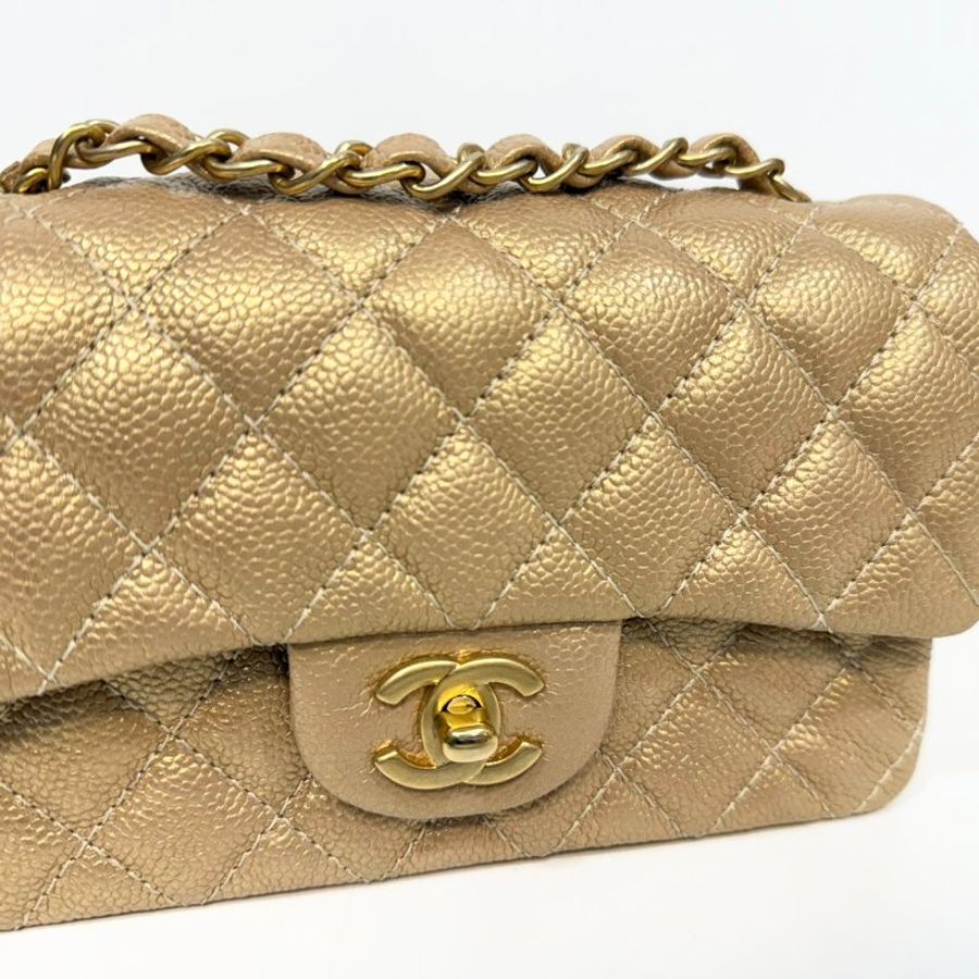 CHANEL 金色牛皮金釦COCO20/A69900-7