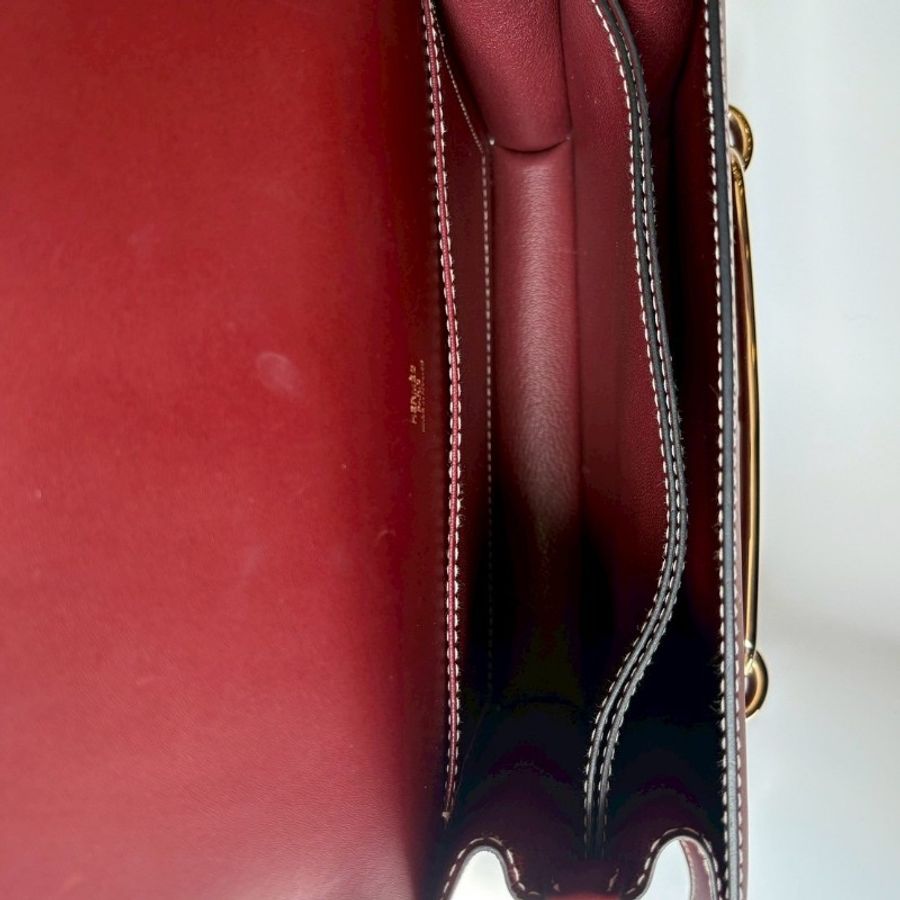 Hermes 金釦酒紅光滑皮 Roulis 豬鼻子包 23-16