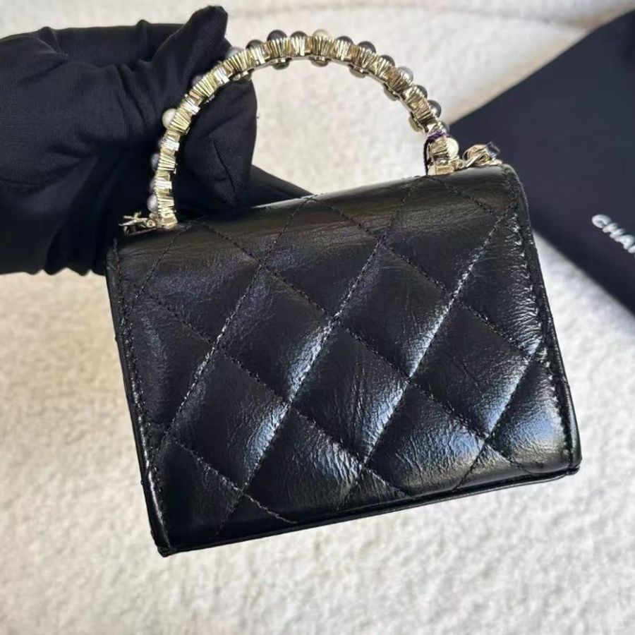 Chanel 24p黑金油蠟皮珍珠手柄小廢包mini woc 全新配件塵袋-5